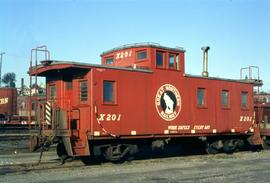 Great Northern Railway Caboose X-201 in red color scheme at Everett Washington in 1969.