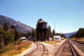 Great Northern Railway water tank at Merritt, Washington, diverging tracks in foreground