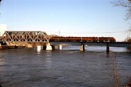 Great Northern Railway local freight Train Number 405 with 4 F-units crossing West Channel bridge...