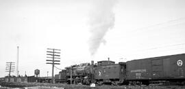 Great Northern Steam Locomotive 840 and Caboose X549 at Hillyard, Washington, undated