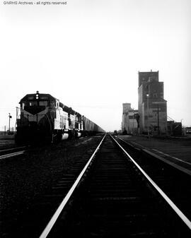 Great Northern unit grain train in Montana bound for Portland, Oregon.  Other subject categories:...