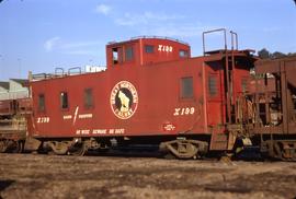Great Northern Railway Caboose X-199 in red color scheme at Seattle Washington in 1971.