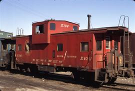 Great Northern Railway Caboose X-104 in red color scheme.