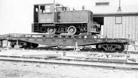 Industrial Diesel Locomotive 7604 on a Canadian National Railway Flat Car, undated