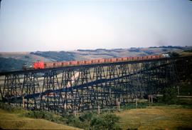 Great Northern Railway work train on Gassman Coulee bridge at Minot, North Dakota in 1969.