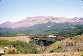 Great Northern Railway Train 98 on Two Medicine Bridge at East Glacier, Montana in 1969.