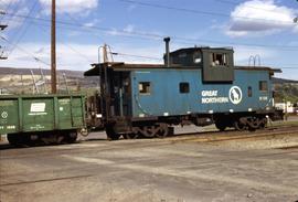 Great Northern Railway Caboose X-135 in Big Sky Blue color scheme at Wenatchee Washington in 1971.