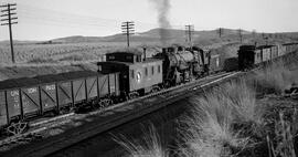Great Northern Caboose X748 and Steam Locomotive 3129 at Hillyard, Washington, undated