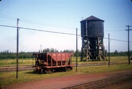 Great Northern Railway ore car and water tank at Superior, Wisconsin