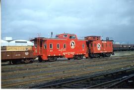 Great Northern Railway cabooses number X3 and X1 at Seattle, Washington in 1958.