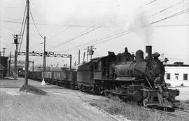 Pacific Coast Railroad freight train at Renton, Washington, circa 1942.