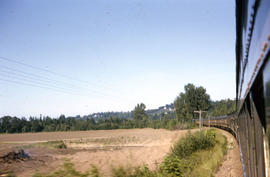 Spokane, Portland and Seattle Railway passenger cars between Portland and Sweet Home, Oregon in 1...