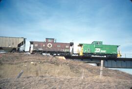 Burlington Northern Cabooses Number 10298, Number 12190 and Grain Hoppers at Minot, North Dakota ...