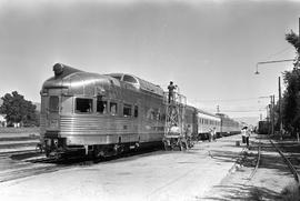 An Amtrak dome observation car gets a wiindow wash at Livingston, Montana on September 2, 1972.