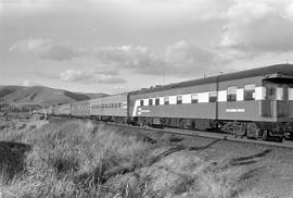 Burlington Northern business car Columbia River on the rear of Amtrak train number 7 at Parker, W...