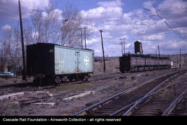 Milwaukee Road  Ice Car 79031 and Boxcab E25 at Beverly, Washington in 1968.