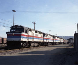 Amtrak diesel locomotive 293 leads train number 11 at Oakland, California on March 31, 1980.