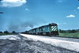 Burlington Northern Diesel Locomotives Number 5048 and 3 Unidentified Diesel Locomotives at Fort ...