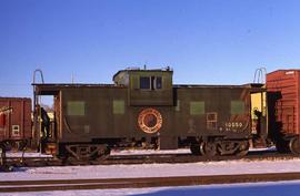 Burlington Northern steel caboose 10050 at Longmont, Colorado, in 1989.