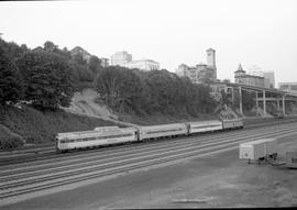 A four car Amtrak passenger train at Tacoma, Washington in July 1975.