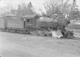 Northern Pacific steam locomotive 328 at Rush City, Minnesota, in 1950.