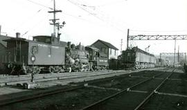 Chicago, Milwaukee, St. Paul and Pacific Railroad freight train at Renton, Washington in December...