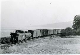 Great Northern Railway caboose X511 in Washington State, undated.