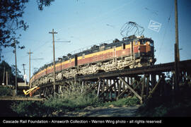 Milwaukee Road boxcab Number E-22 at Black River, Washington in 1963.