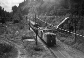 Pacific Coast Railroad passenger train  at Cedar Mountain, Washington in 1958.