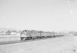 Northern Pacific North Coast Limited passenger train departing Livingston, Montana, circa 1953.