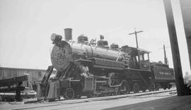 Polson Logging Company Steam Locomotive Number 90 at Railroad Camp, Washington, circa 1948.