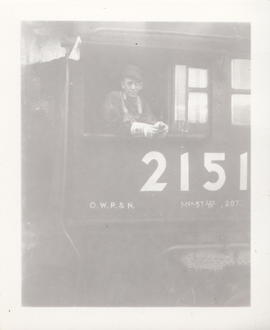 Engineer William Woody on Oregon-Washington Railroad and Navigation steam locomotive 2151 circa 1...