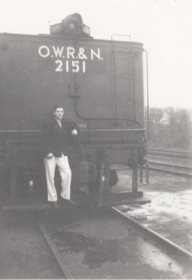 Jack Woody, son of Engineer William Woody, on the rear of the tender of Oregon-Washington Railroa...