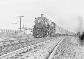 Northern Pacific passenger train number 407 at Black River, Washington, circa 1947.