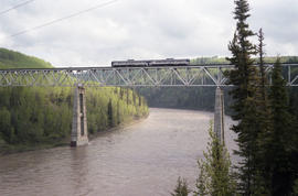 British Columbia Railway Company rail diesel cars at East Pine River Bridge, British Columbia on ...