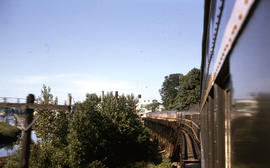 Spokane, Portland and Seattle Railway passenger cars between Portland and Sweet Home, Oregon in 1...