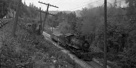 Pacific Coast Railroad steam locomotive number 14 at Cedar Mountain, Washington in 1942.