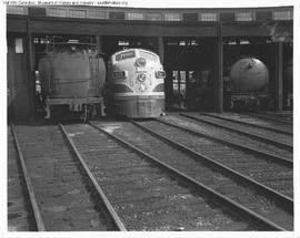 Great Northern Diesel Locomotive 511 with Steam Locomotives at Interbay, Washington Roundhouse in...