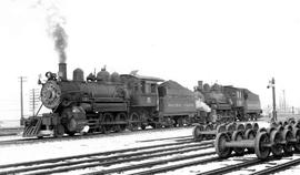 Pacific Coast Railroad steam locomotives number 15 and 14 at Auburn, Washington, circa 1950.