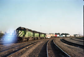 Burlington Northern locomotive 7815 leads freight train 21 at Kansas City, Missouri, on August 1,...