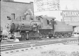 Northern Pacific steam locomotive 1076 at 15th Street Tower in Tacoma, Washington, circa 1950.