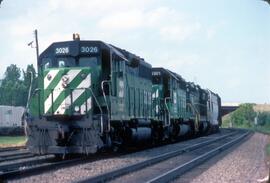 Burlington Northern Diesel Locomotives Number 3026, Number 6301 and Precision Lease Engine at Sai...