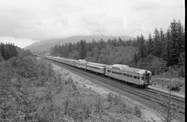 Amtrak passenger train number 8 at Kanaskat, Washington on June 5, 1975.