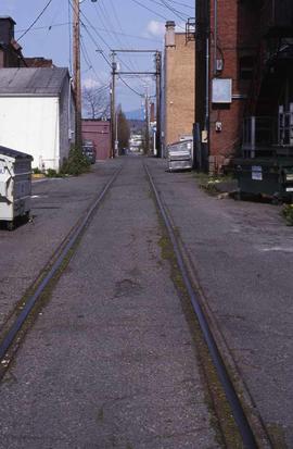 Northern Pacific rail remaining in the alley at Bellingham, Washington, in 2001.