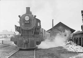 Northern Pacific mixed train number 735 at Rush City, Minnesota, in 1950.