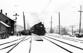 Chicago Milwaukee St. Paul and Pacific Railroad passenger train at Maple Valley, Washington, circ...