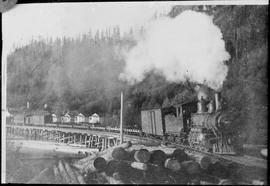 Northern Pacific steam locomotive at Blue Canyon, Washington, circa 1910.