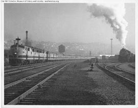 Great Northern Diesel Locomotive 503 Leading a Passenger Train at Interbay, Washington in 1947.