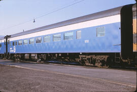 Great Northern Coach 1212 (part of the Burlington Northern since March 1, 1970) at Whitefish, Mon...