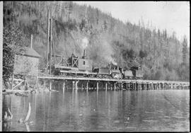 Northern Pacific steam locomotive at Lake Whatcom, Washington, circa 1910.